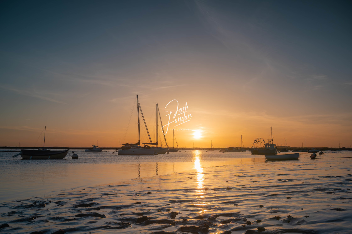 "Mersea island front at golden hour" stock image