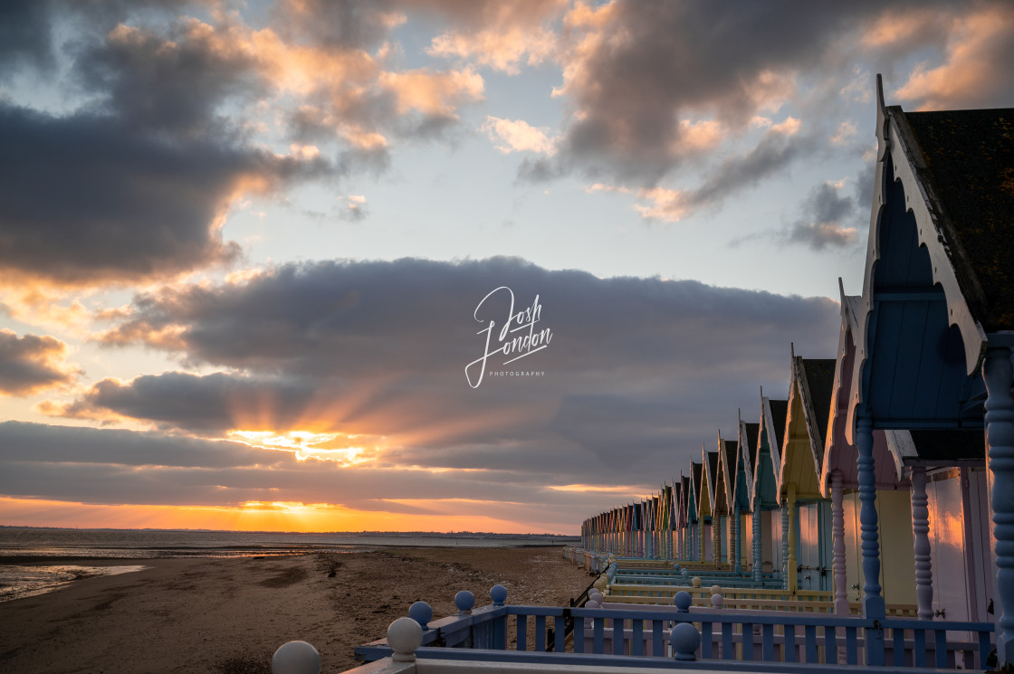 "Golden hour from Mersea island beach huts" stock image