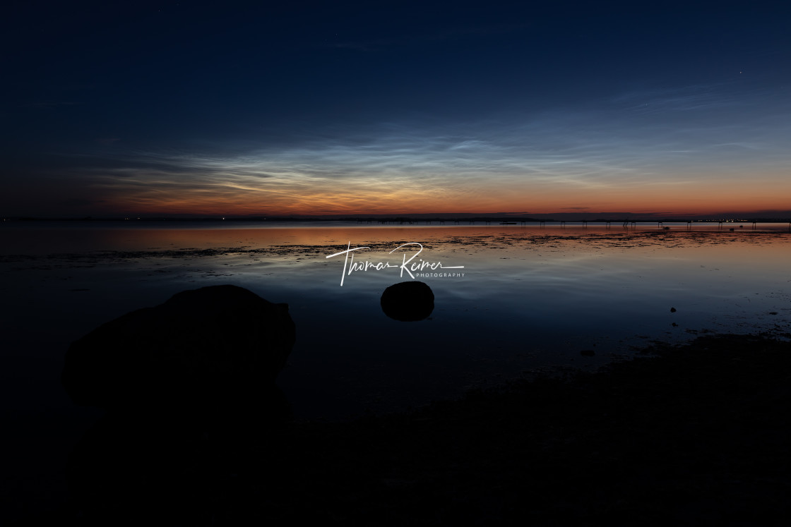"Noctilucent Clouds performing a nightly spectacle over Roskilde" by Thomas Reimer - $12.70 "Noctilucent Clouds performing a nightly spectacle over Roskilde" stock image