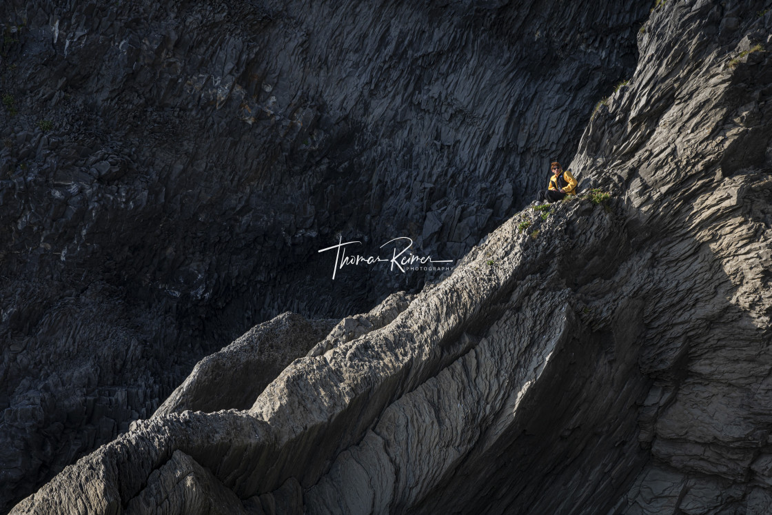 "Young man on top of basalt rocks in Iceland" by Thomas Reimer - $12.70 "Young man on top of basalt rocks in Iceland" stock image