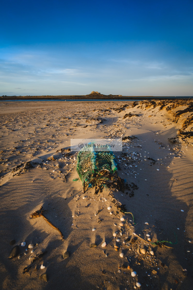 "Lobster Crate at Ross Sands with Lindisfarne in the background" by Philip Mowbray - $14.79 "Lobster Crate at Ross Sands with Lindisfarne in the background" stock image