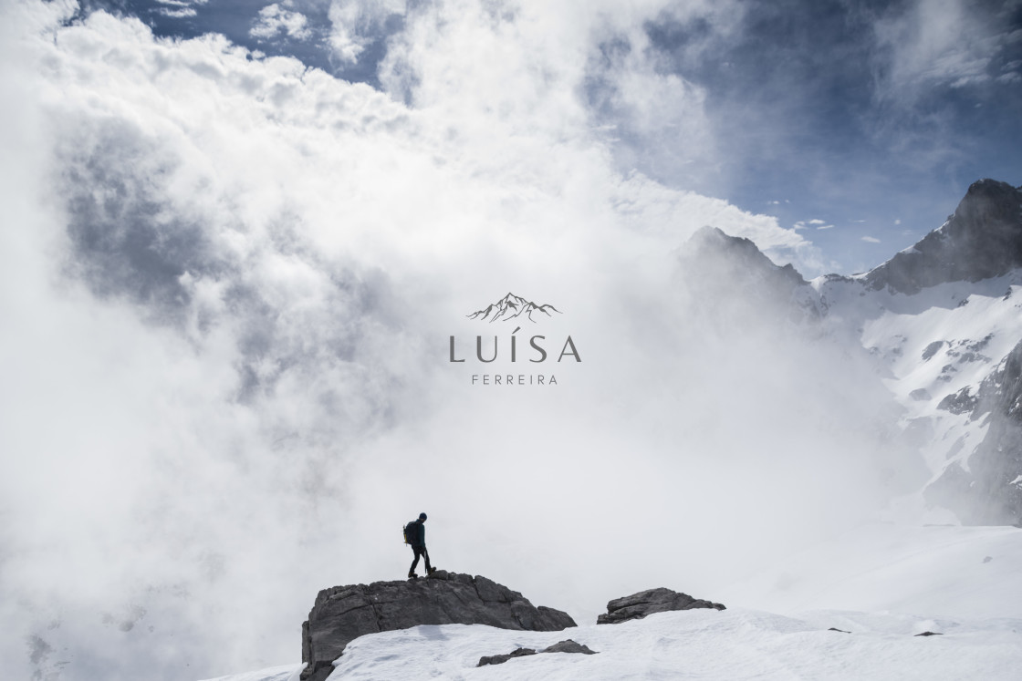 "Person standing on the edge of a rock" by Luísa Ferreira - $12.26 "Person standing on the edge of a rock" stock image
