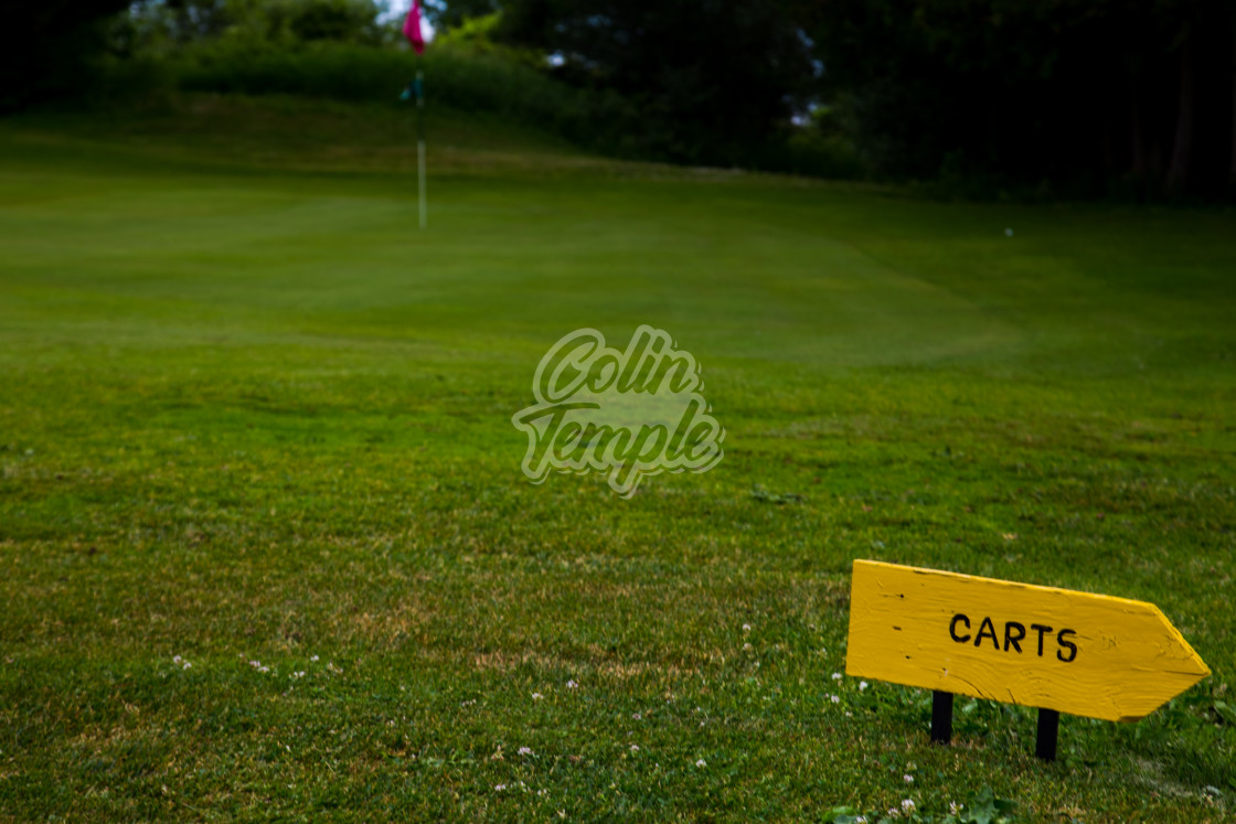 "Golf Course Sign Directs Carts This Way" by Colin Temple - £4.04 "Golf Course Sign Directs Carts This Way" stock image