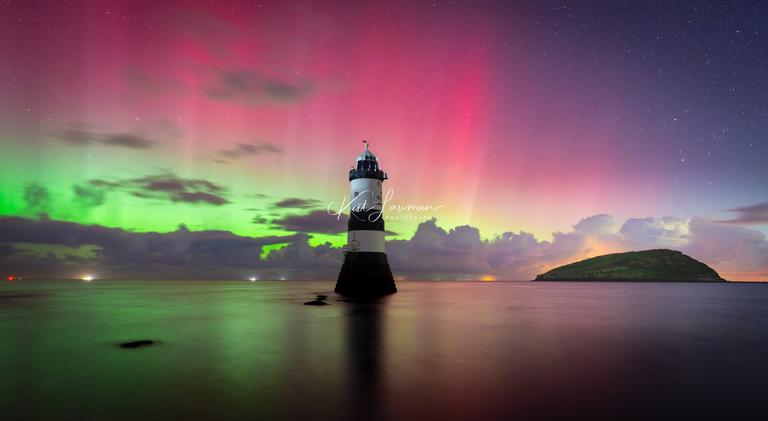 "Northern Lights over Penmon Lighthouse, Anglesey" stock image