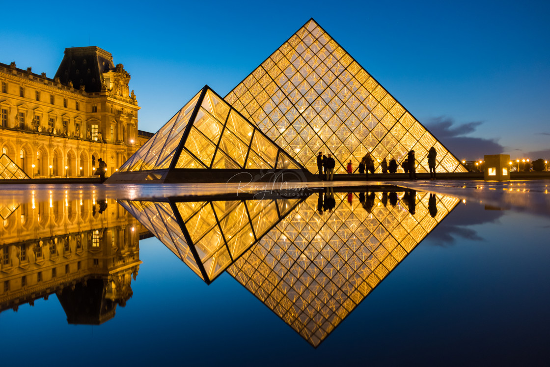 "iew of famous Louvre Museum with Louvre Pyramid at evening" by Remy Musser Premium Collection - £50.00 "iew of famous Louvre Museum with Louvre Pyramid at evening" stock image
