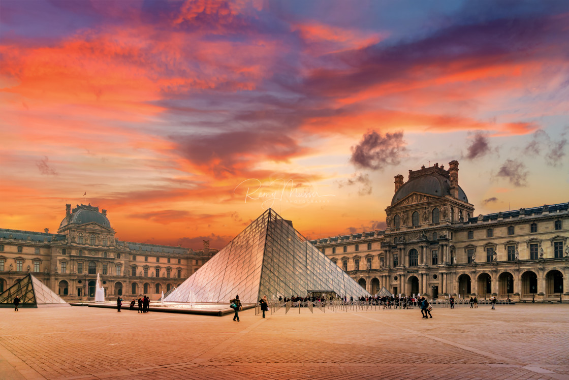 "View of famous Louvre Museum with Louvre Pyramid" by Remy Musser Premium Collection - £50.00 "View of famous Louvre Museum with Louvre Pyramid" stock image