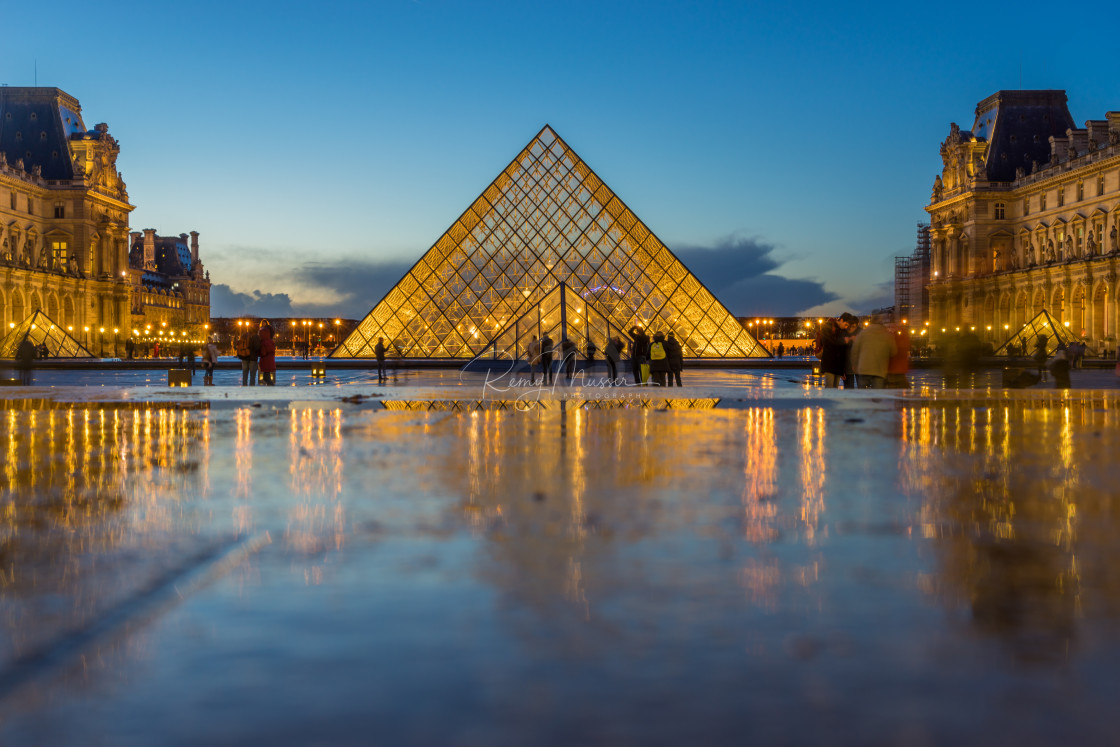 "iew of famous Louvre Museum with Louvre Pyramid at evening" by Remy Musser Premium Collection - £50.00 "iew of famous Louvre Museum with Louvre Pyramid at evening" stock image