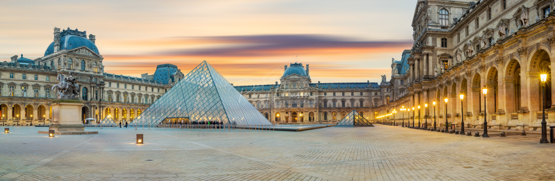 "iew of famous Louvre Museum with Louvre Pyramid at evening" by Remy Musser Premium Collection - £50.00 "iew of famous Louvre Museum with Louvre Pyramid at evening" stock image