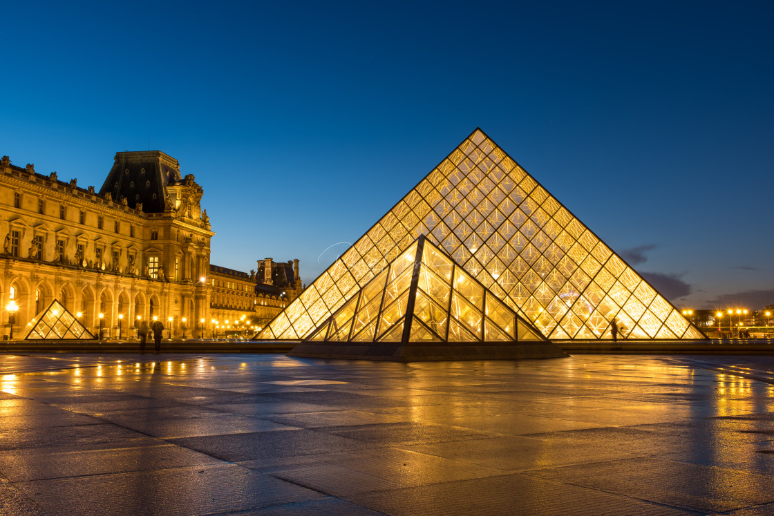 "iew of famous Louvre Museum with Louvre Pyramid at evening" by Remy Musser Premium Collection - £50.00 "iew of famous Louvre Museum with Louvre Pyramid at evening" stock image