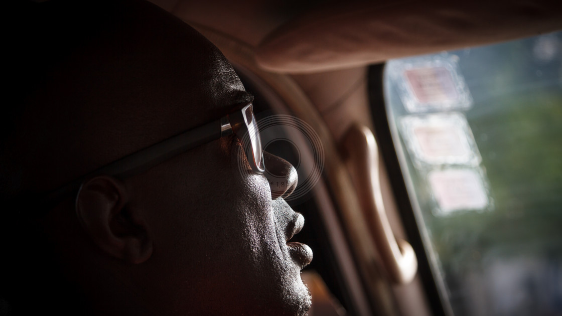 "Profile taxi driver" by Urban Photo Lab - £13.50 "Profile taxi driver" stock image