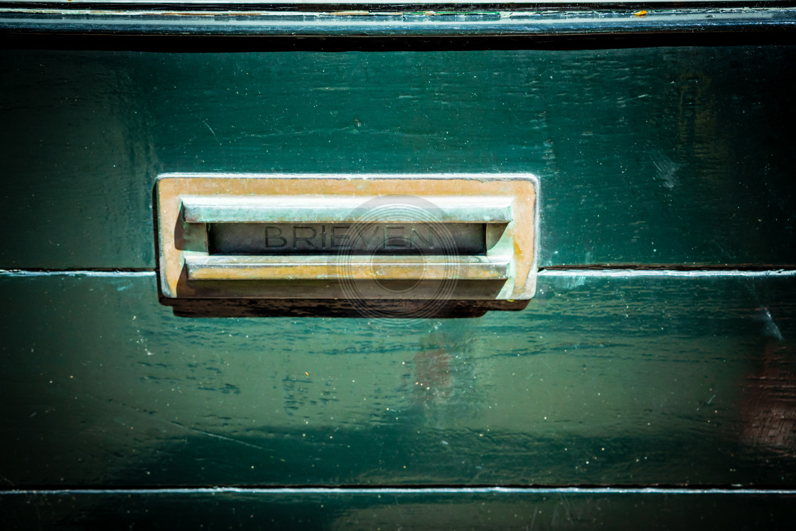 "Ornate letterbox green door" by Urban Photo Lab - £13.50 "Ornate letterbox green door" stock image