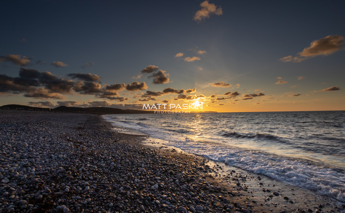 "Pebble Beach at Sunset." stock image