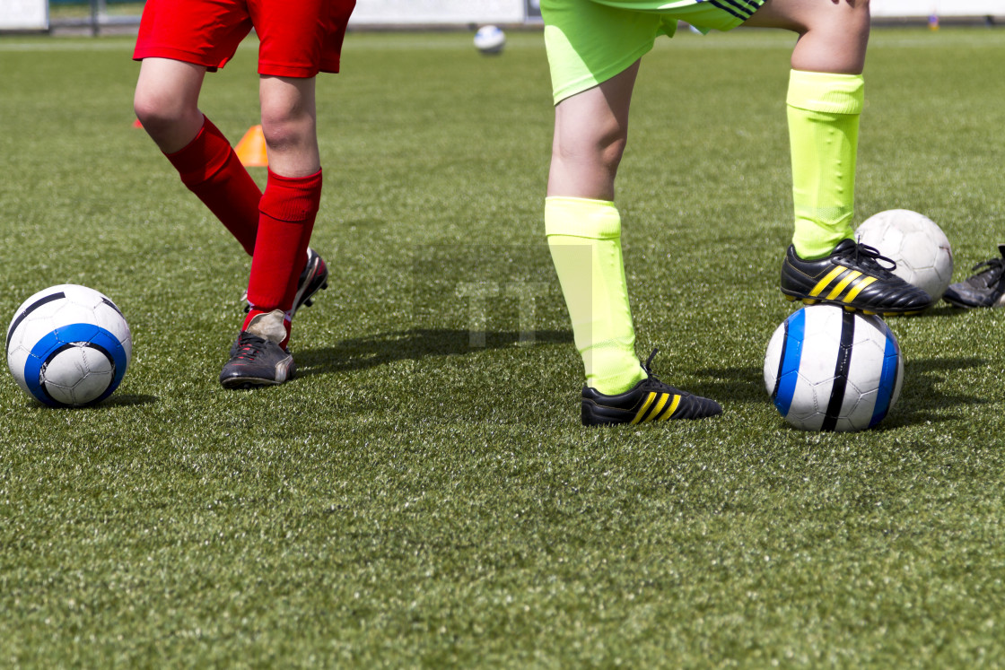 "Two young soccer players training" stock image