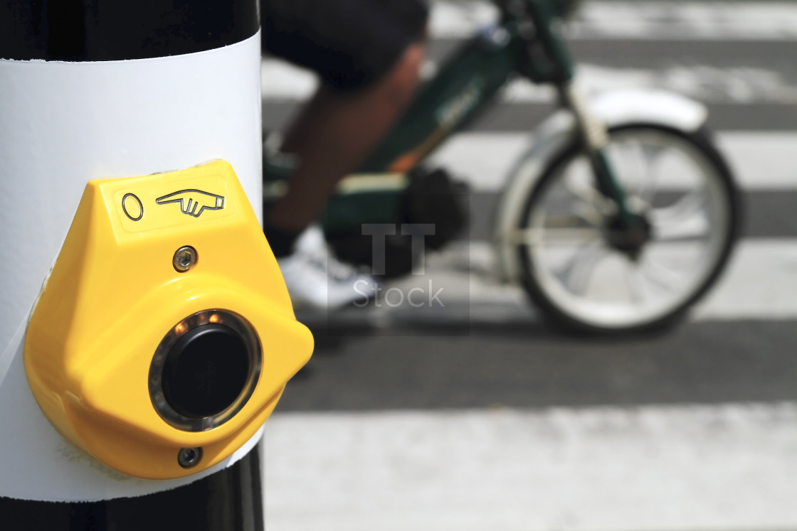 "Yellow crosswalk button blurred scooter" stock image