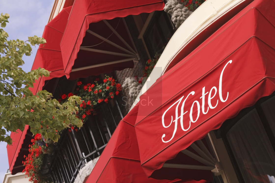 "Bright red hotel awnings" stock image