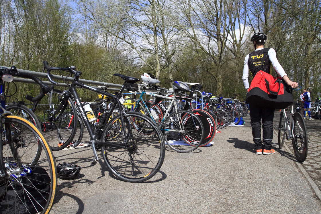 "Contestant arriving with his bike before the race on Saturday" stock image