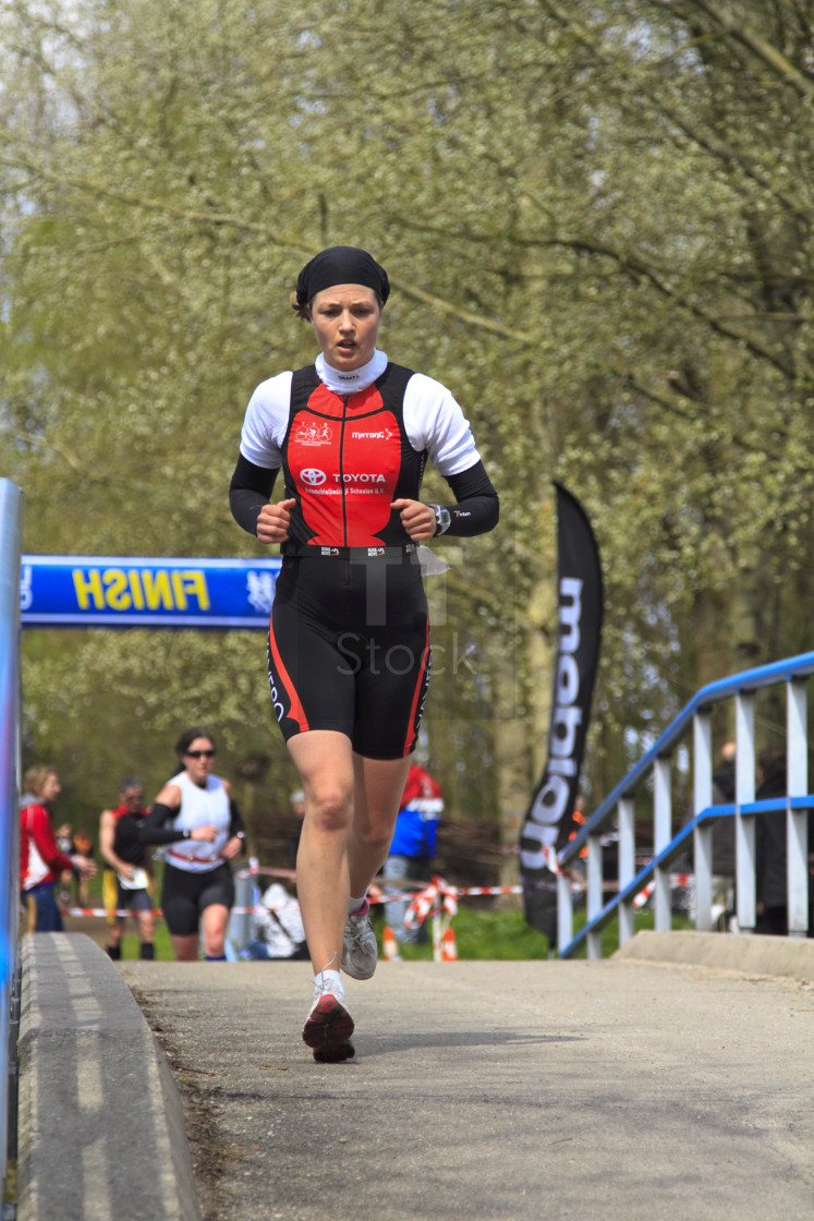 "Annegreet Moree running the course of the dualthlon" stock image