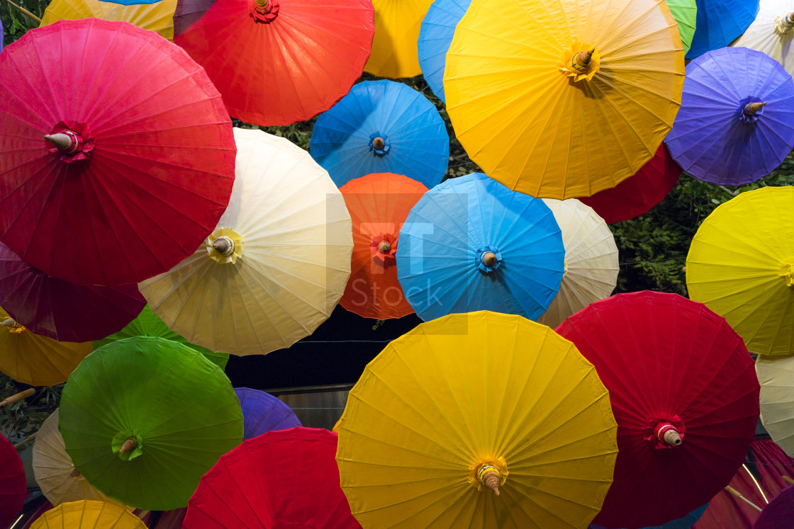 "Umbrellas at the night market" stock image