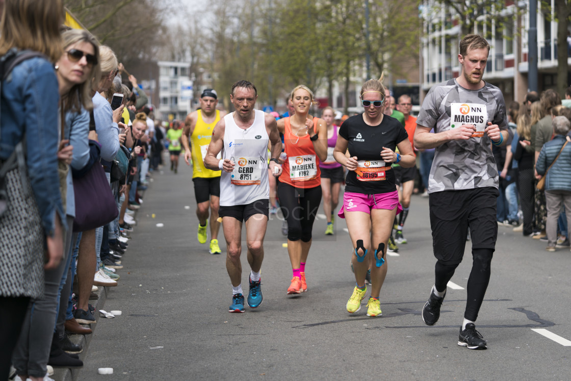 "Running the race together" stock image