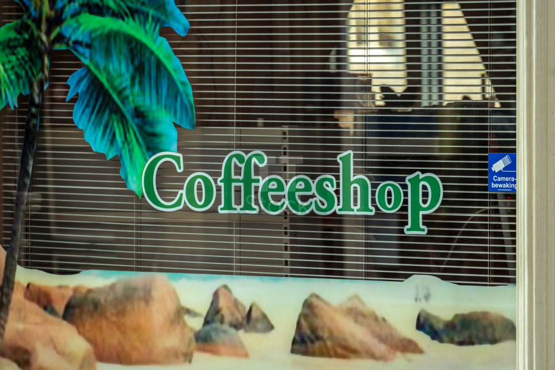 "Coffeshop window and sign in a dutch shopping street" stock image