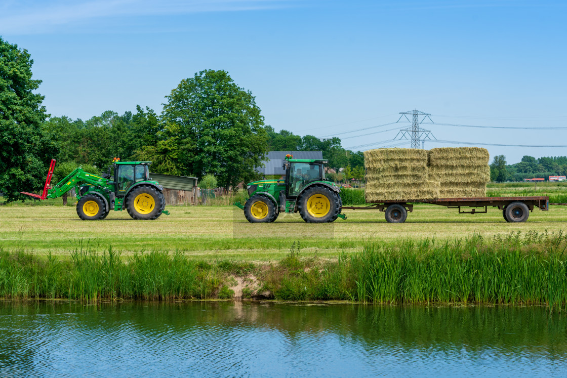 "Harvesting bales of hay 1" stock image