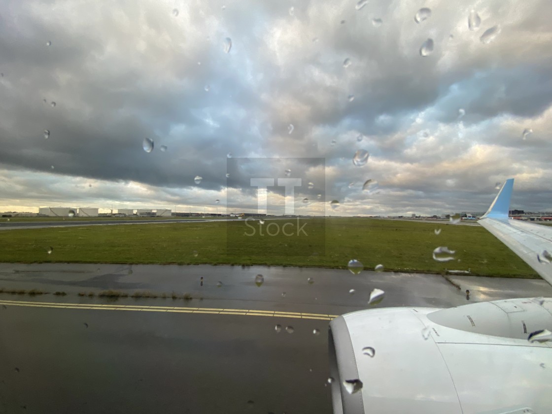 "Taxiing at Schiphol airport on a bad weather rainy day." stock image