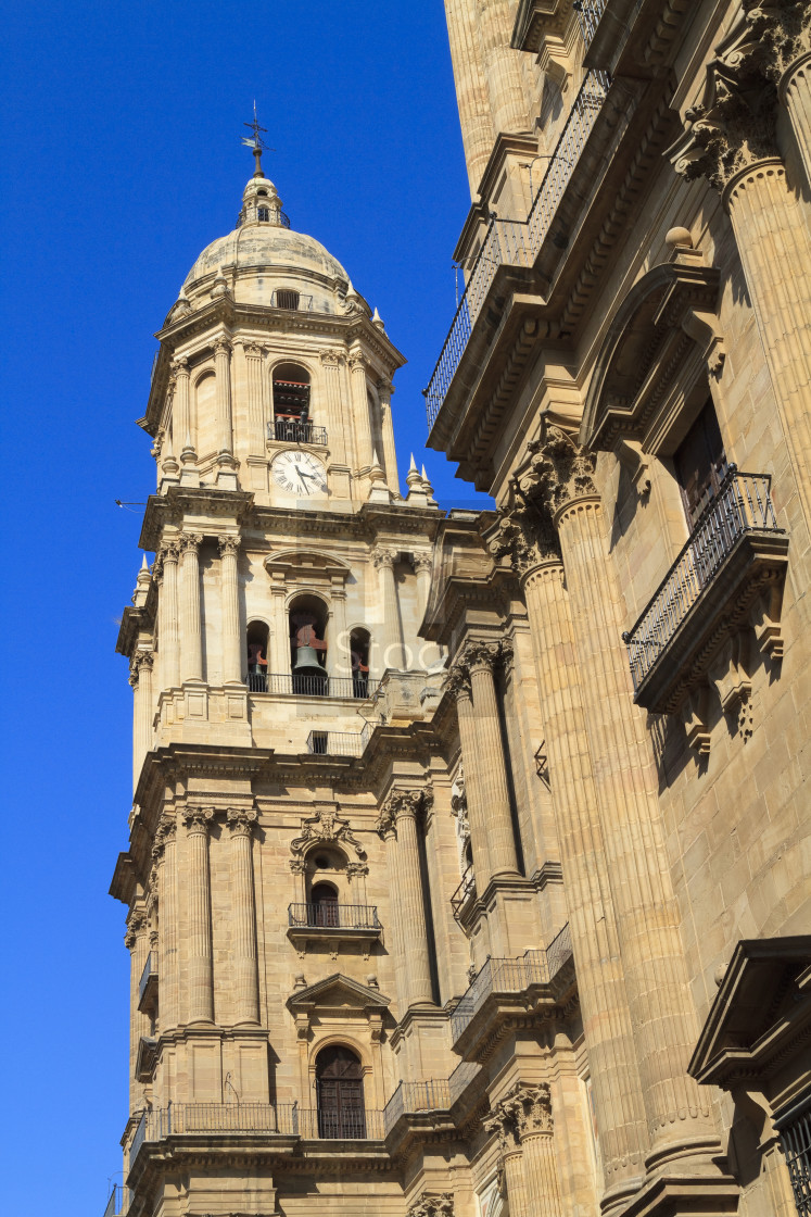 "Malaga Cathedral against a deep blue sky" stock image