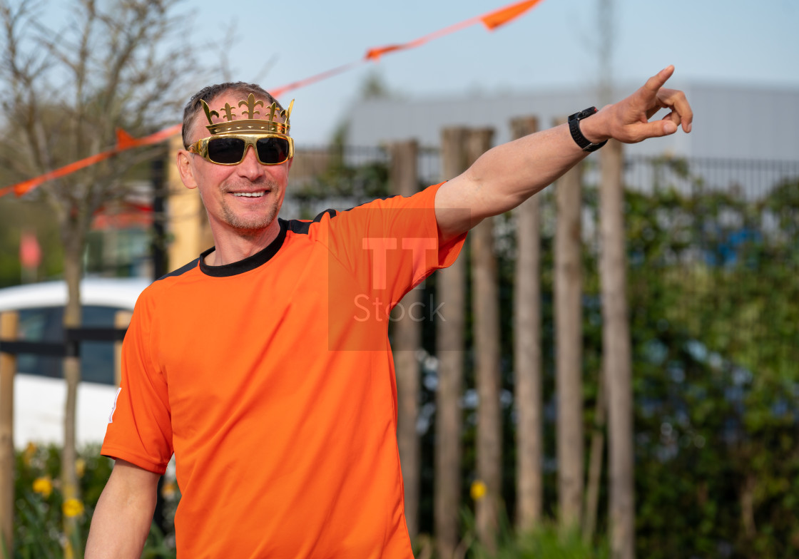 "Oranje Kings day man pointing" stock image