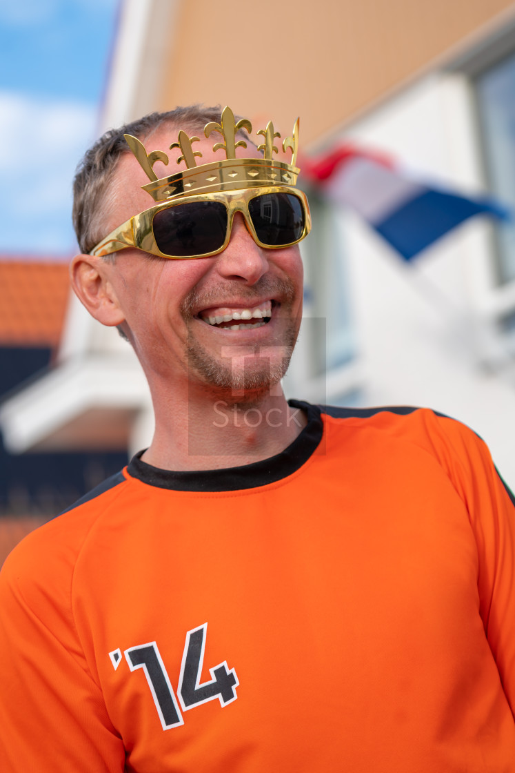 "Oranje Kings day man laughing" stock image