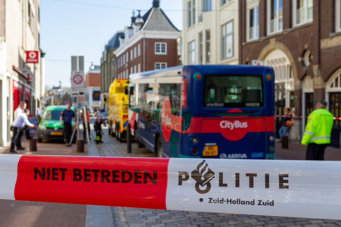 "Police scene tape in red & white do not enter" stock image