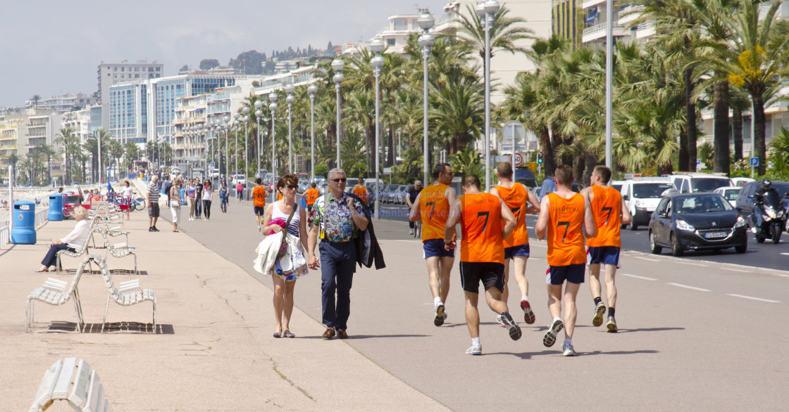 "Firemen Running on the Boulevard des Anglais, Nice, France" stock image