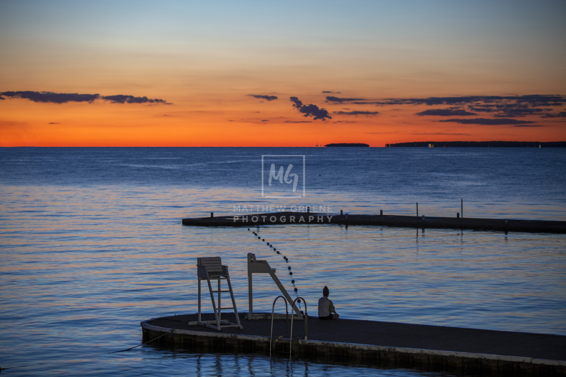 "Tranquil sunset at the Lakeside pier" stock image