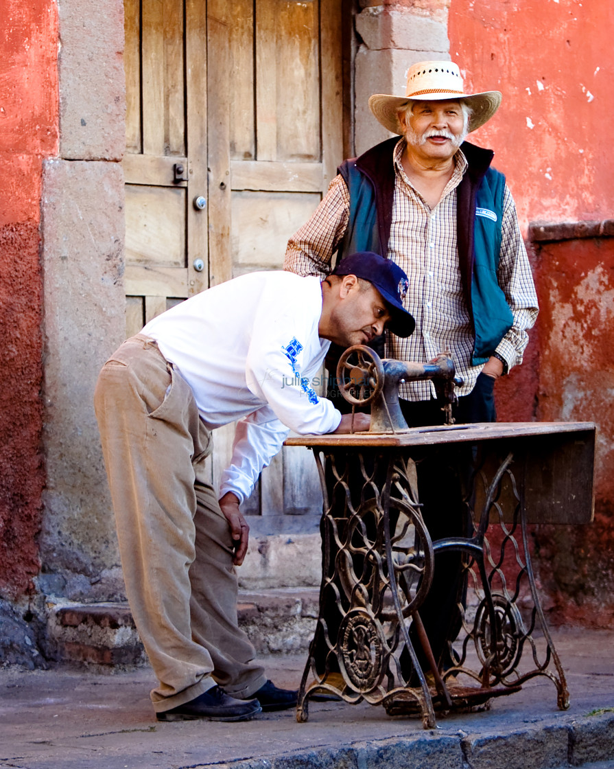 "Sewing Men" stock image