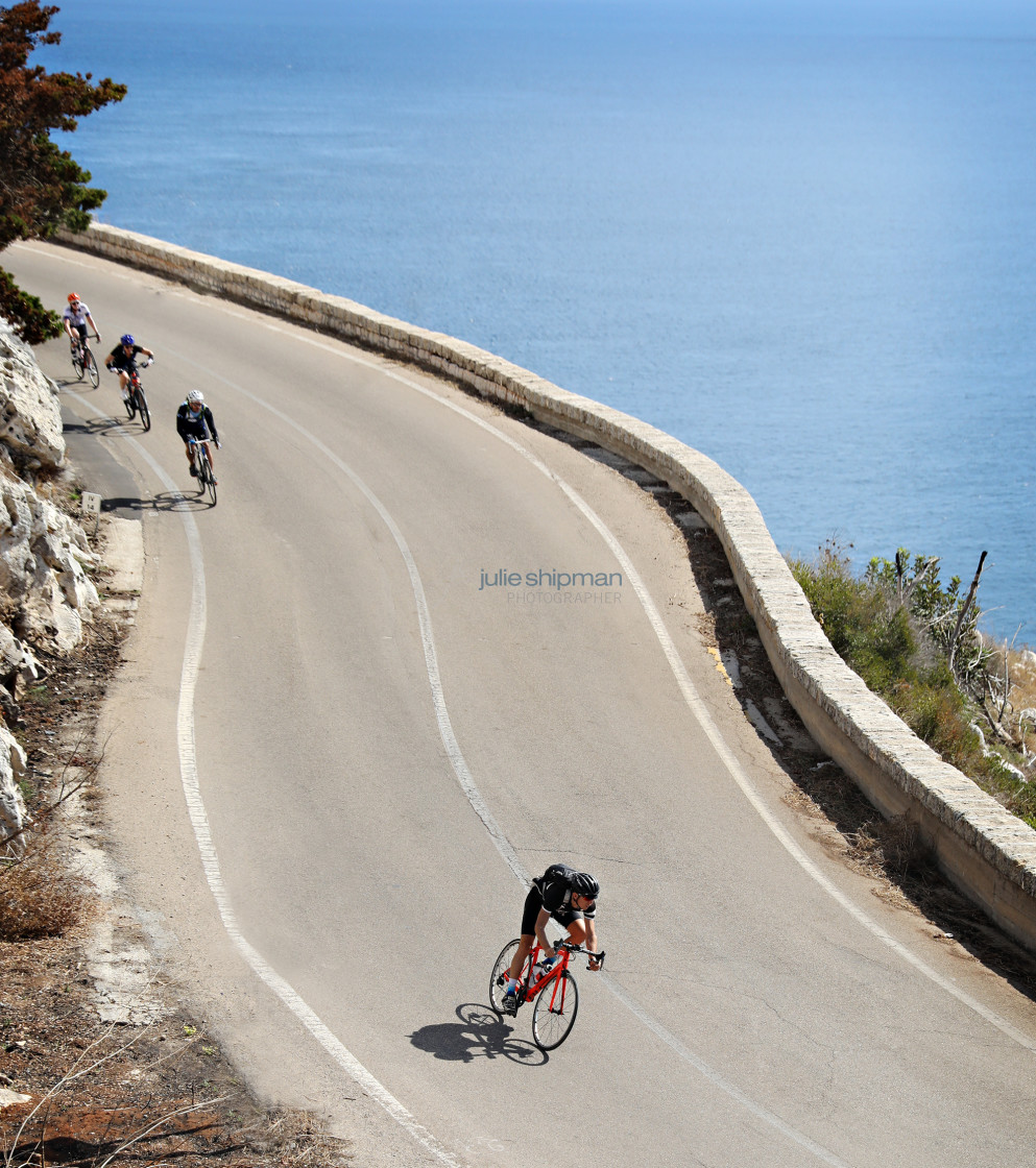 "Cyclists Along the Coast" stock image