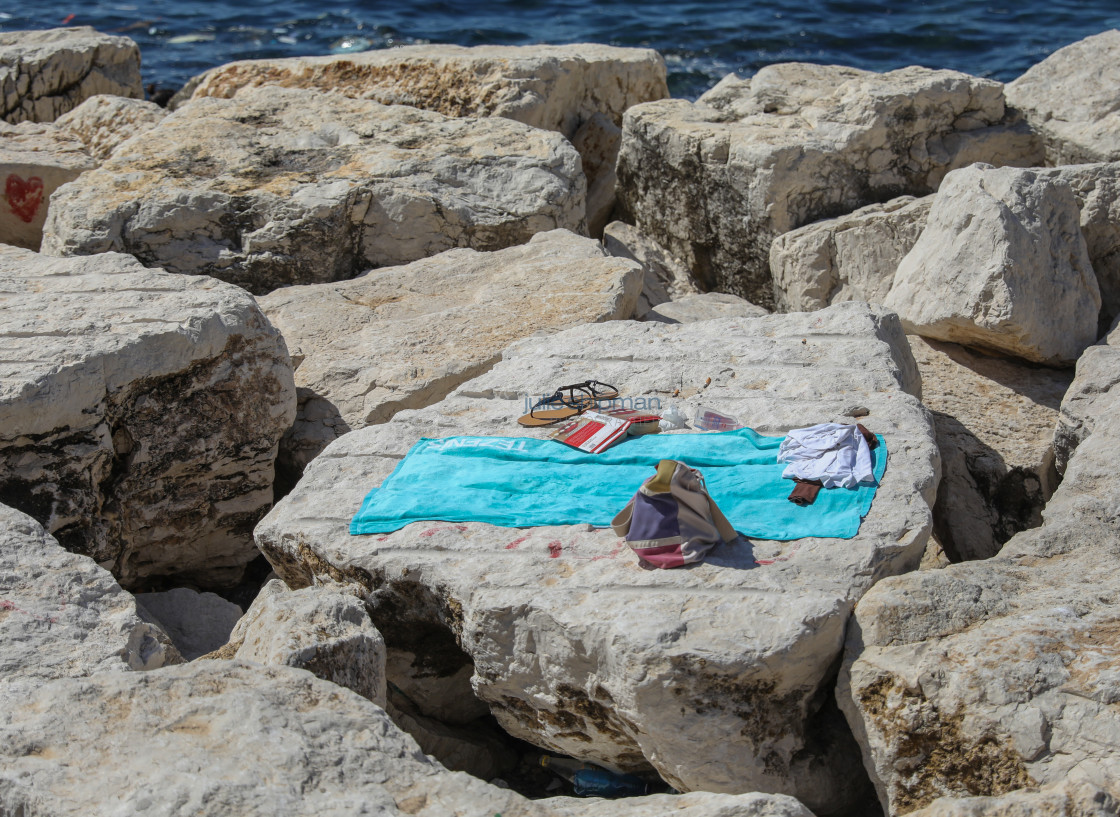 "Towel on the Rocks" stock image