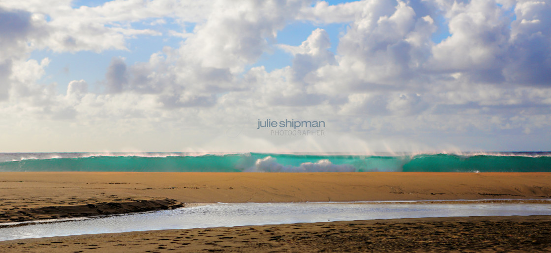 "A wave crashes on Kalalau." stock image