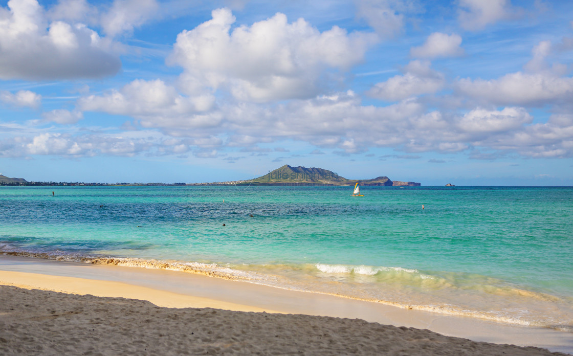 "A small sailboat off Oahu." stock image