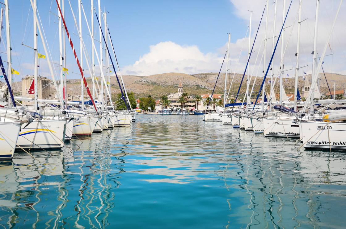 "Sailboats lined up in Trogir, Croatia." stock image