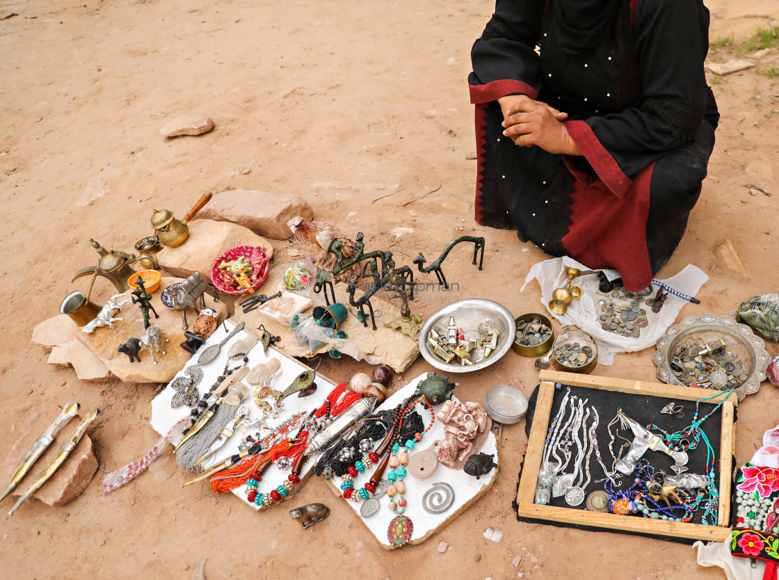 "A woman selling her treasures along the Jordan Trail." by Julie Shipman - $18.66 "A woman selling her treasures along the Jordan Trail." stock image