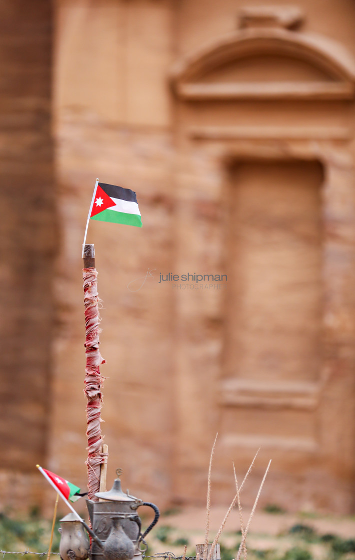 "A small Jordanian flag coming out of a tea pot in front of the Monastery in Petra." by Julie Shipman - $18.66 "A small Jordanian flag coming out of a tea pot in front of the Monastery in Petra." stock image