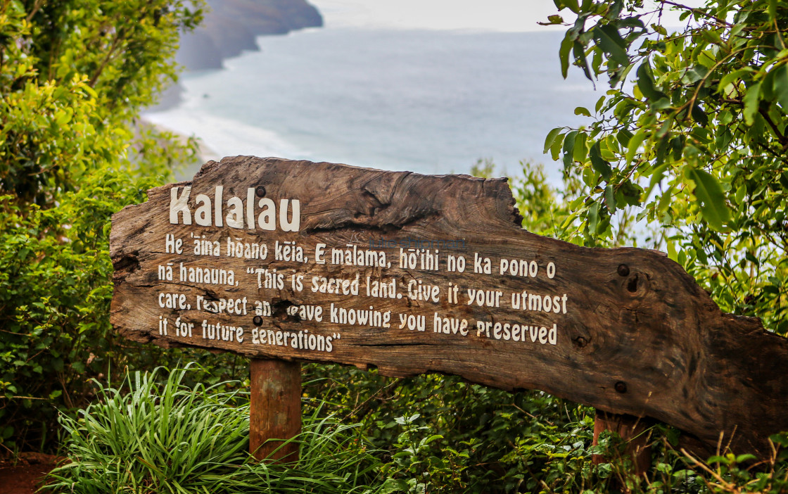 "The sign to the Kalalau Trail with spectacular views of the Kalalau in Kauai, Hawaii, USA." stock image