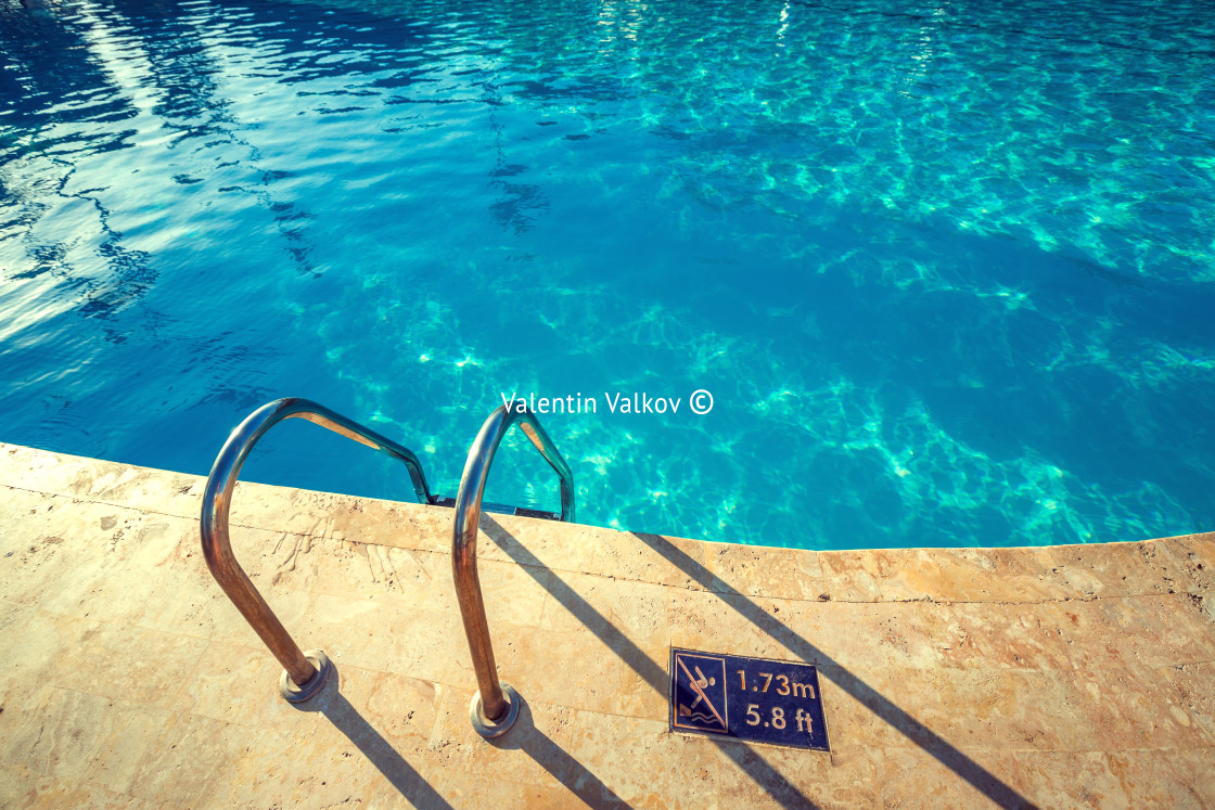 "Swimming pool with stair and clear water" stock image