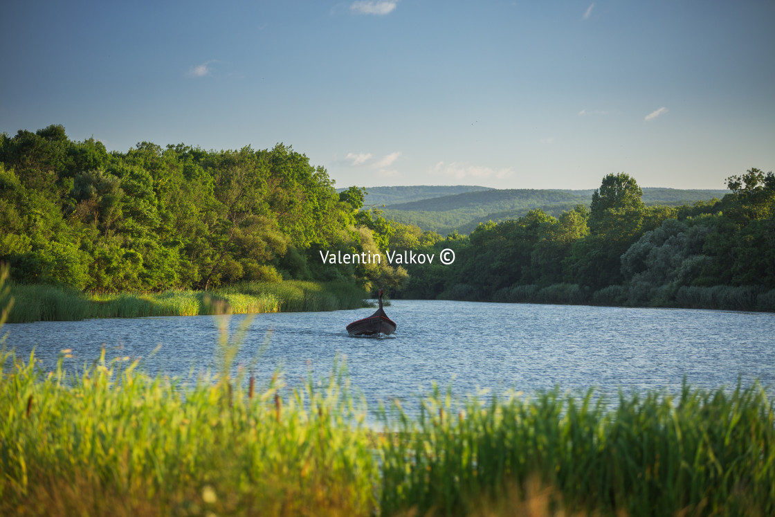 "Sport boat sailing in the river through the summer day" stock image