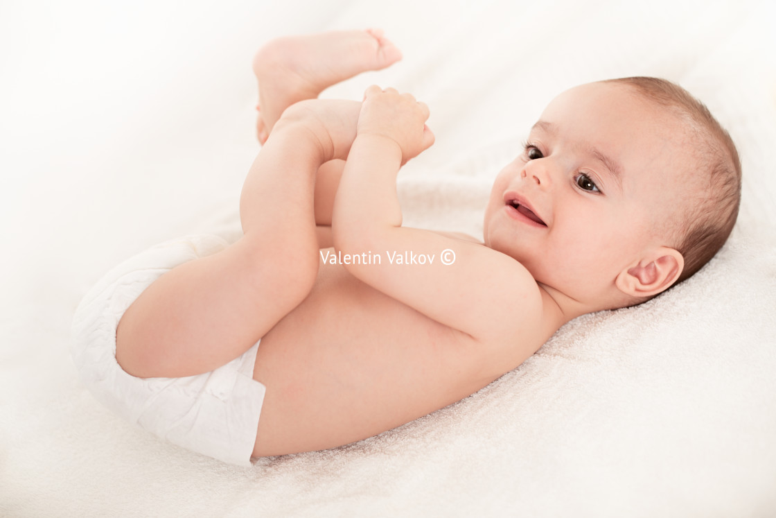 "Bright portrait of adorable baby on white" stock image