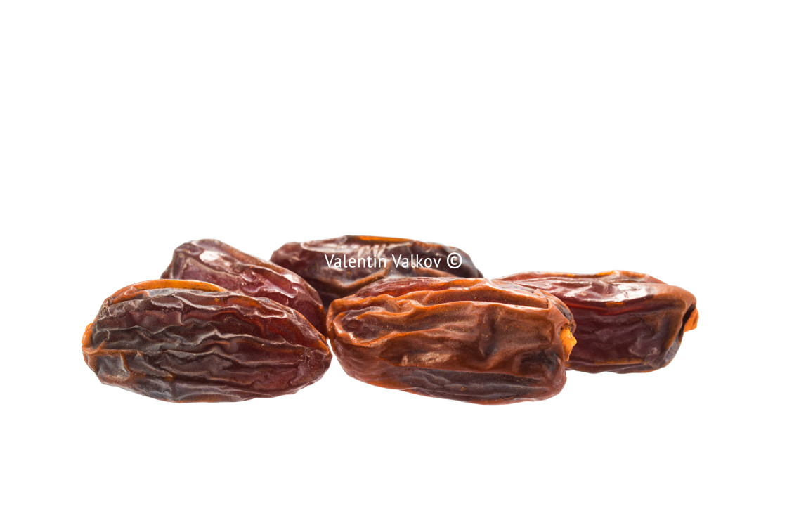 "Dried delicious dates isolated on a white" stock image