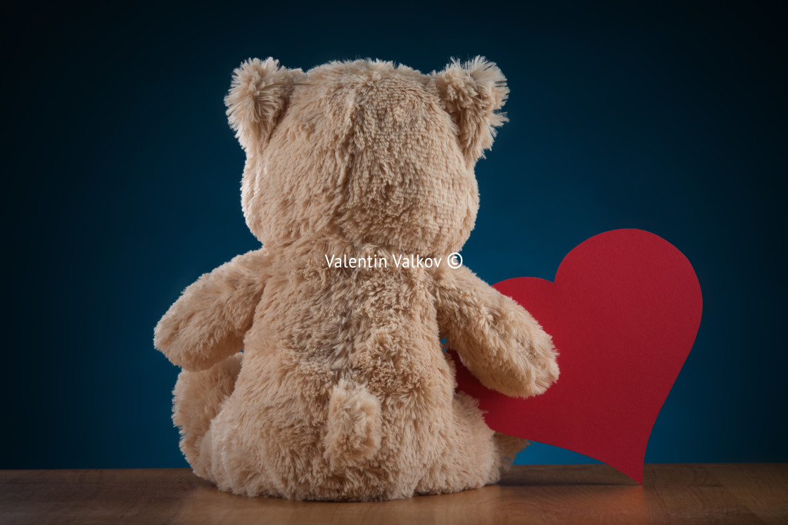 "Teddy Bear Holding a Heart" stock image