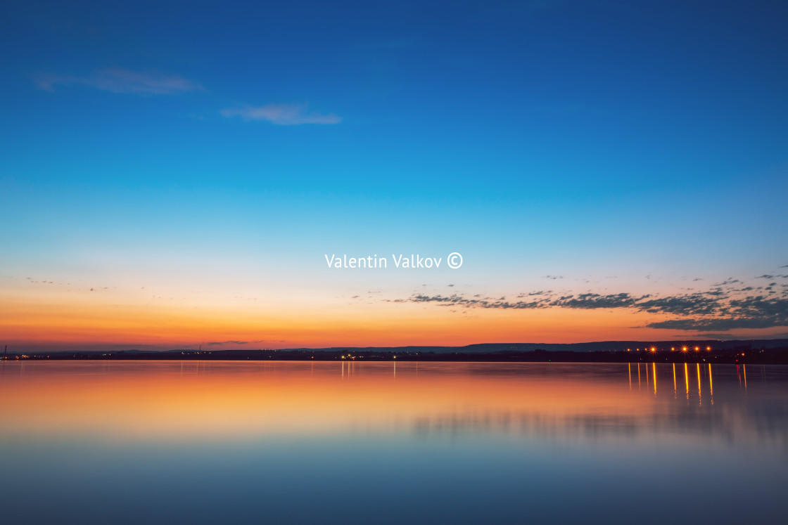 "Colourful sunset over lake" stock image