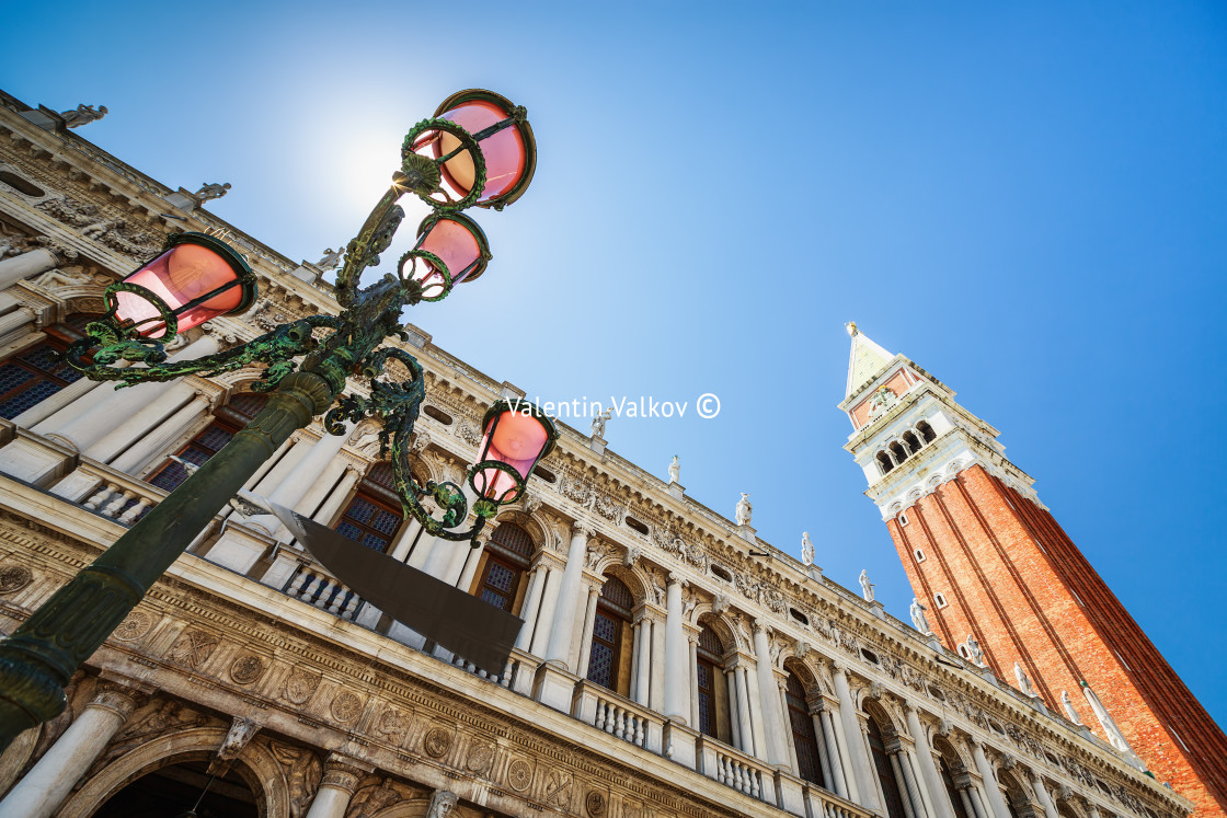 "Scenic street lamp in Venice, Italy against blue sky" stock image