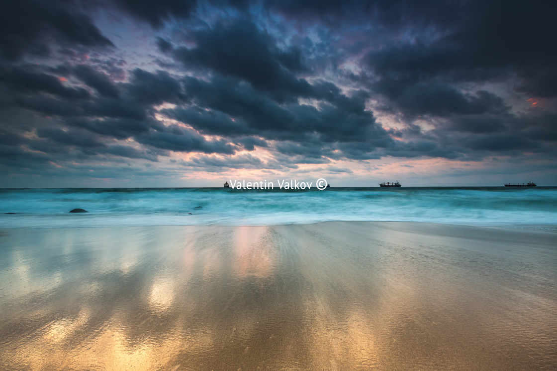 "Dramatic sunset on the ocean beach" stock image