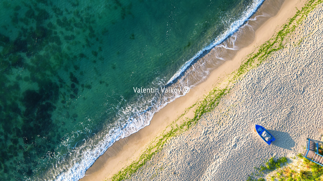 "Aerial view of ocean waves and sand on beach" stock image